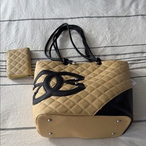 Elegant Black and Tan Quilted Tote Bag with matching wallet.